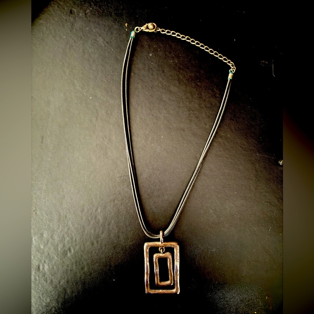 Silver Geometric Pendant Necklace with Layered Design